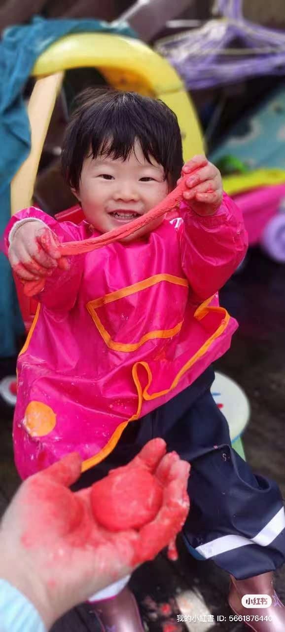 Childcare professional with children